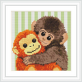 The scene depicts two monkeys cuddling closely, with a green and white striped background.