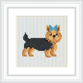 A cross stitch pattern of a Yorkshire Terrier with a blue bow, depicted on a simple background.
