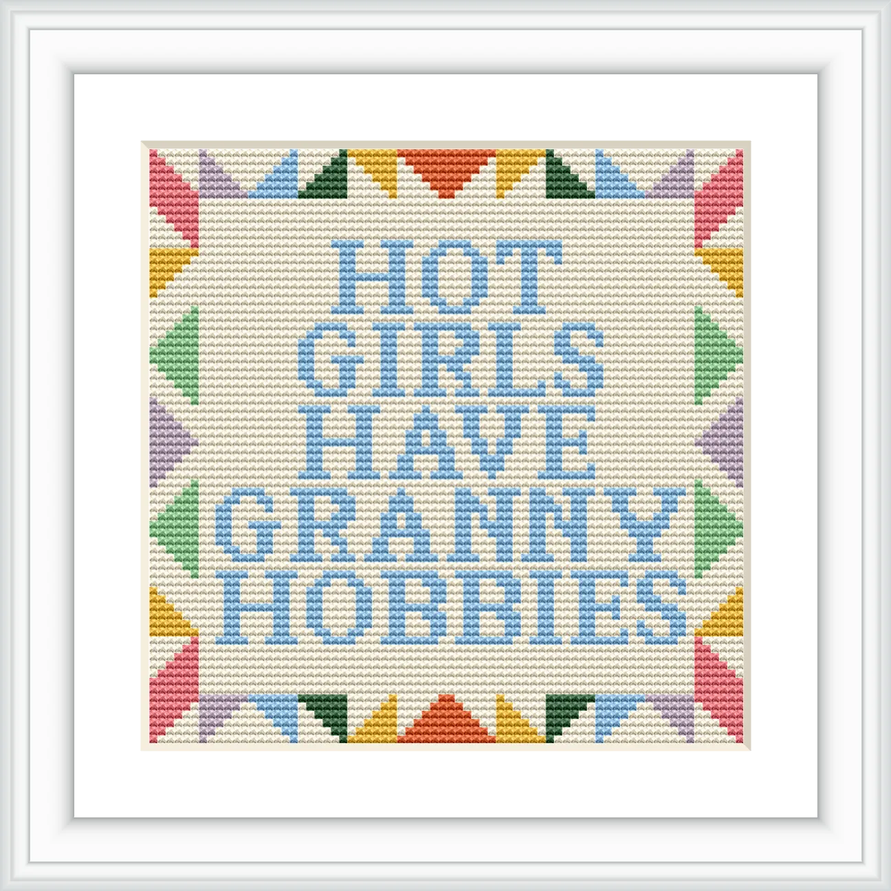 The image features a text-based cross stitch design with the phrase 'Hot Girls Have Granny Hobbies' surrounded by a colorful geometric border. The colors used are pastel shades, and the design is centered on a neutral background.