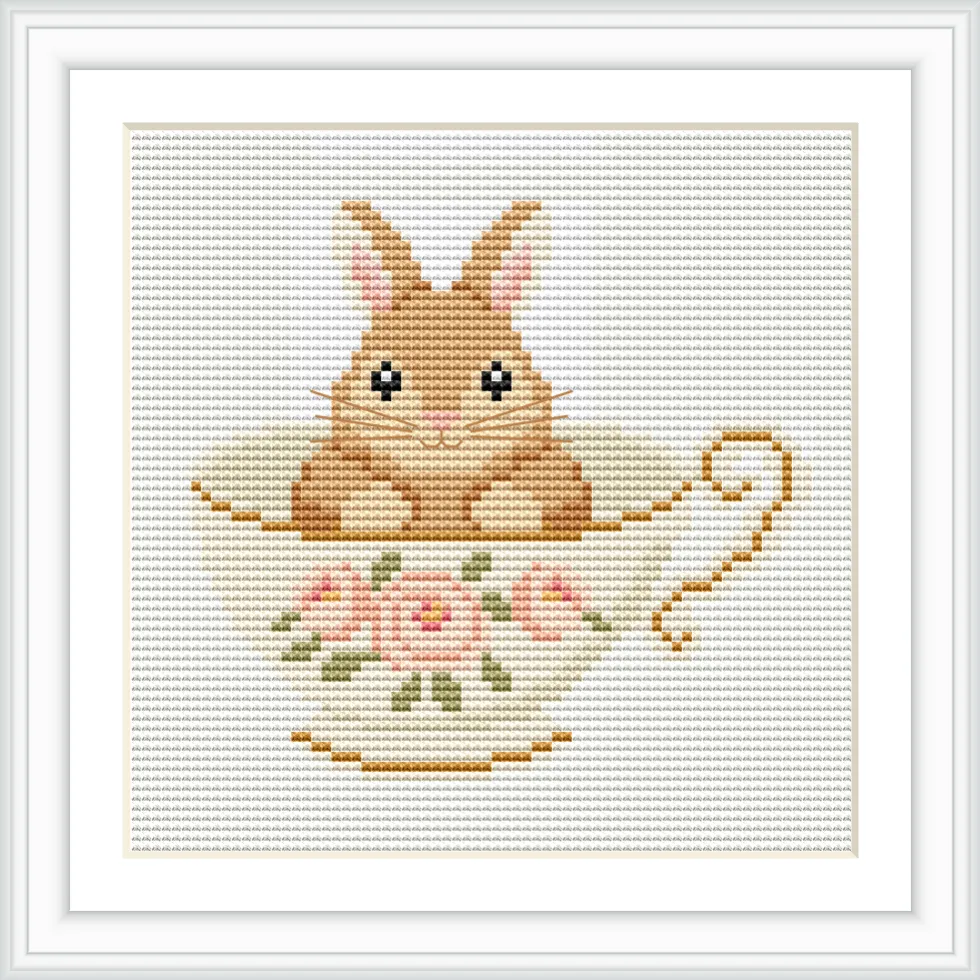 A fluffy brown bunny is sitting inside a floral patterned teacup with roses. The teacup is centered in the image.