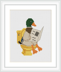 The image shows a mallard duck sitting on a yellow toilet, holding a newspaper in its wings.