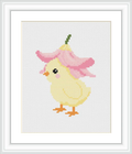 A small, cute chick stands wearing a pink flower as a hat. The chick is centrally positioned against a plain background.