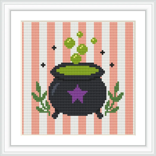 A black cauldron is centered on a pink and white striped background. Green bubbles rise from the cauldron, and green herbs are placed on both sides of it, with a purple star on the cauldron's side.