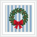 The image features a green wreath with red berries and a large red bow, set against a background of vertical blue and white stripes. The wreath is centered in the frame.