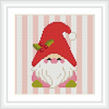 The image showcases a gnome with a red hat, adorned with leaves and berries, standing against a pink and white striped background. The gnome has a long white beard and rosy cheeks.