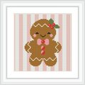 A gingerbread man with a pink bow tie and red buttons stands against soft pink and white vertical stripes. It has a holly decoration with green leaves and red berries on its head.