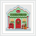 A small, festive post office building labeled 'North Pole Post' with a red door, surrounded by Christmas decorations including a mailbox, wreath, and presents.