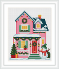 The image depicts a pink Christmas house adorned with green shutters, wreaths, and a snow-covered roof. A snowman stands cheerfully beside the house, and a Christmas tree is decorated next to the entrance.