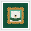 The image features a bear's head wearing a green sweater, displayed within a golden frame on a dark green background.