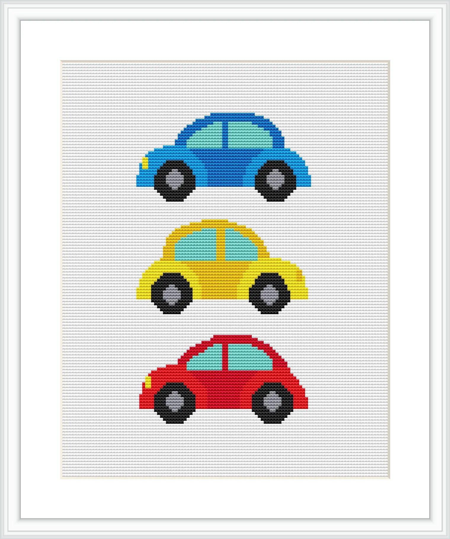 The image displays a cross stitch pattern with three cartoon-style cars stacked vertically. Each car is a different color – the top one is blue, the middle yellow, and the bottom red.