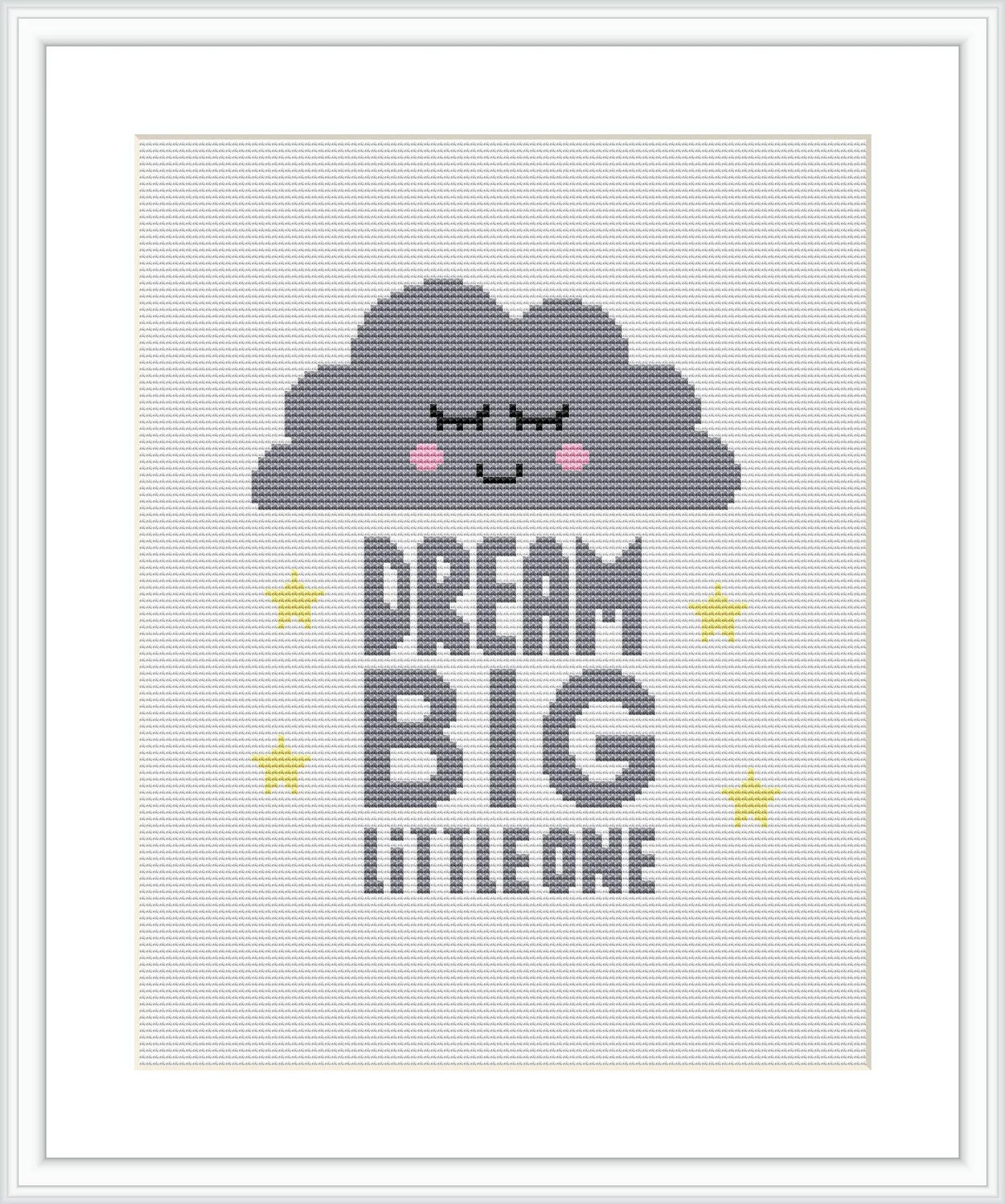 The image depicts a cross stitch pattern featuring a smiling cloud centered above the phrase 'DREAM BIG LITTLE ONE', surrounded by small stars, all stitched onto a white evenweave fabric, framed in a simple white picture frame.