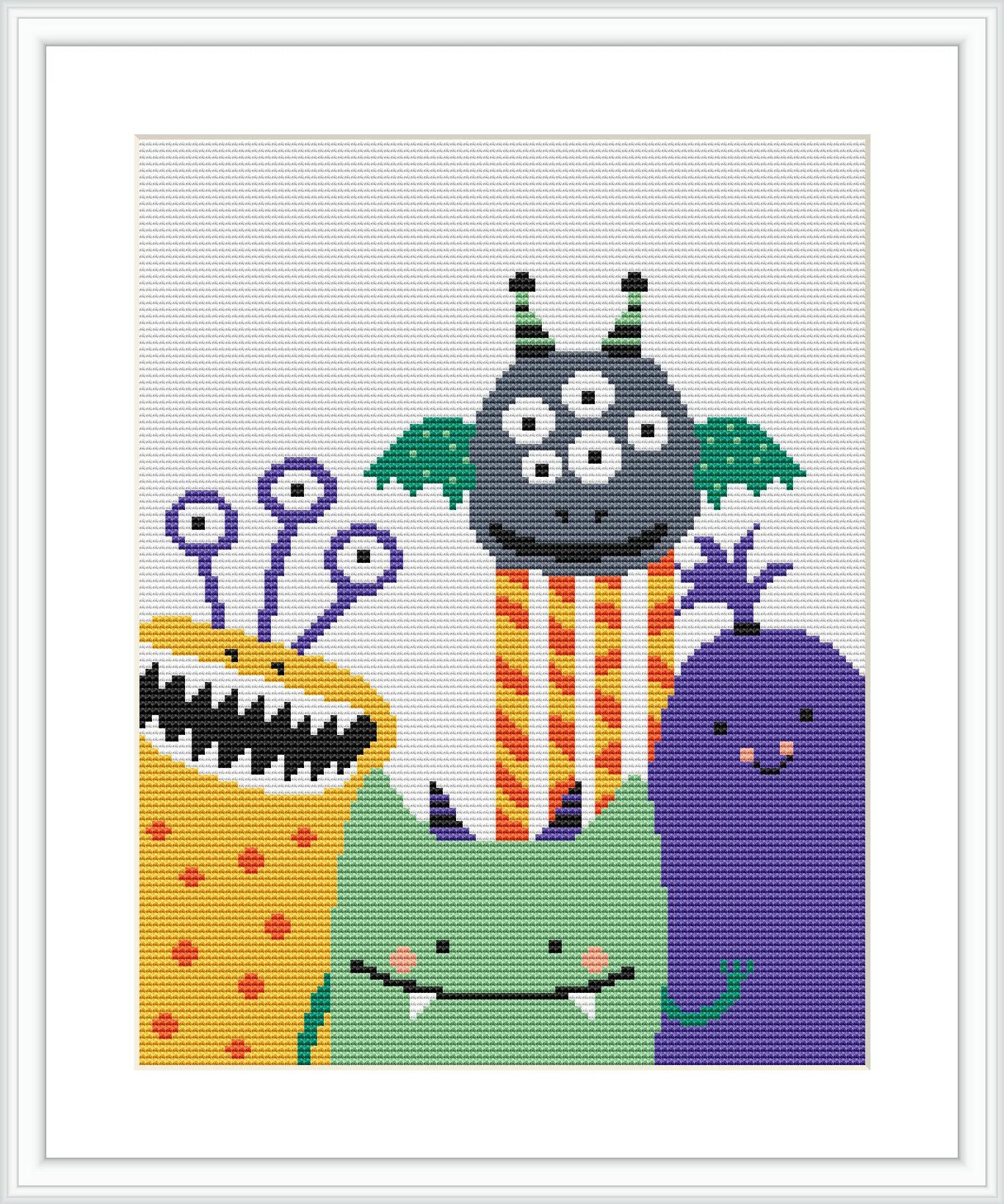 The image presents four cute and colorful cartoon-like monsters with different shapes and expressions, stitched on a plain white background. They are arranged side by side, filling the frame with an amusing variety.