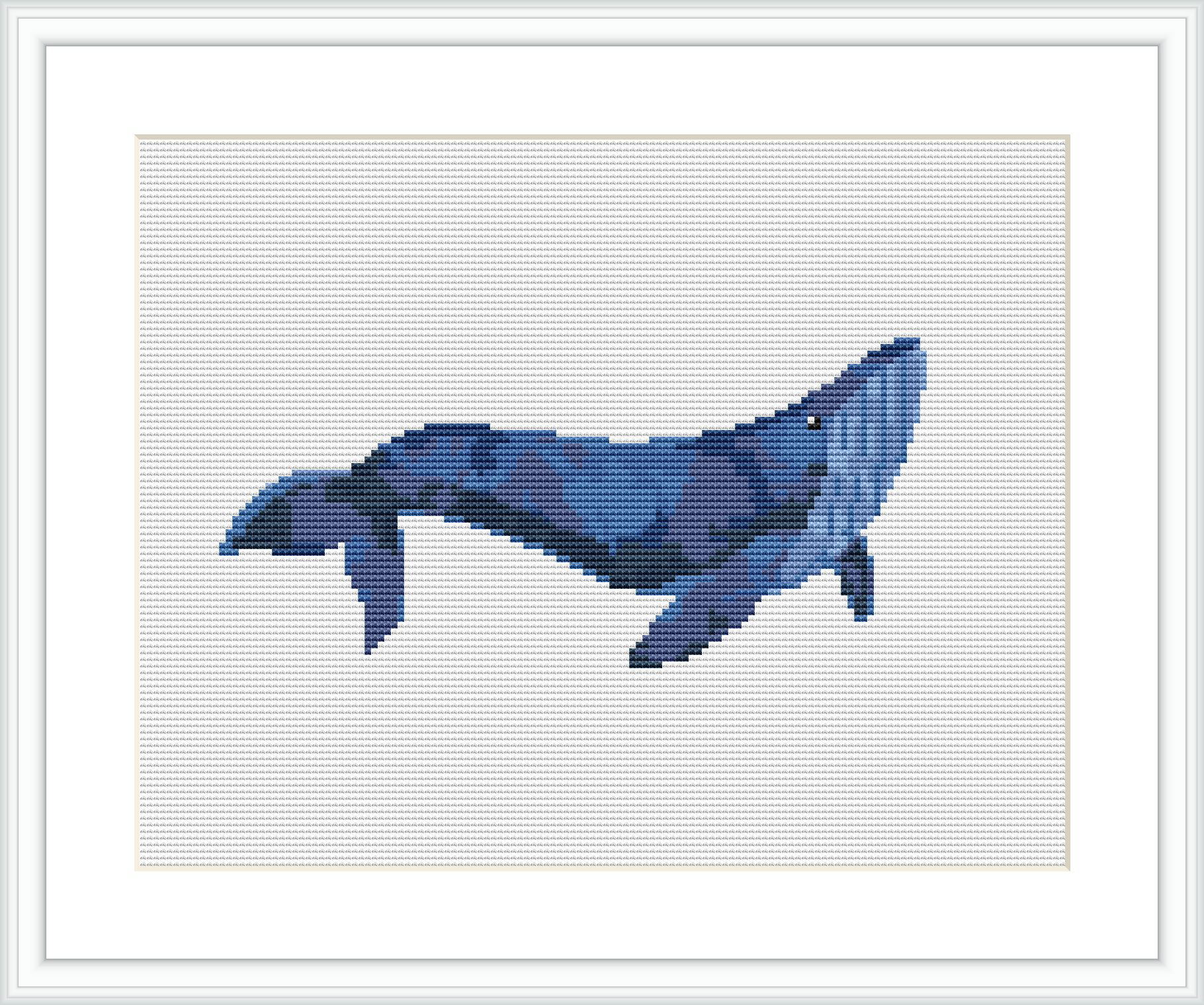 The image shows a cross stitch pattern of a whale. It is comprised of various shades of blue, creating a pixelated and detailed representation of the whale set against a plain, light background.