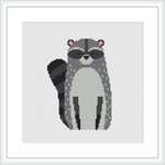 The image showcases a cross stitch pattern design featuring a raccoon in a standing position, with a white background and a grey frame around the design.