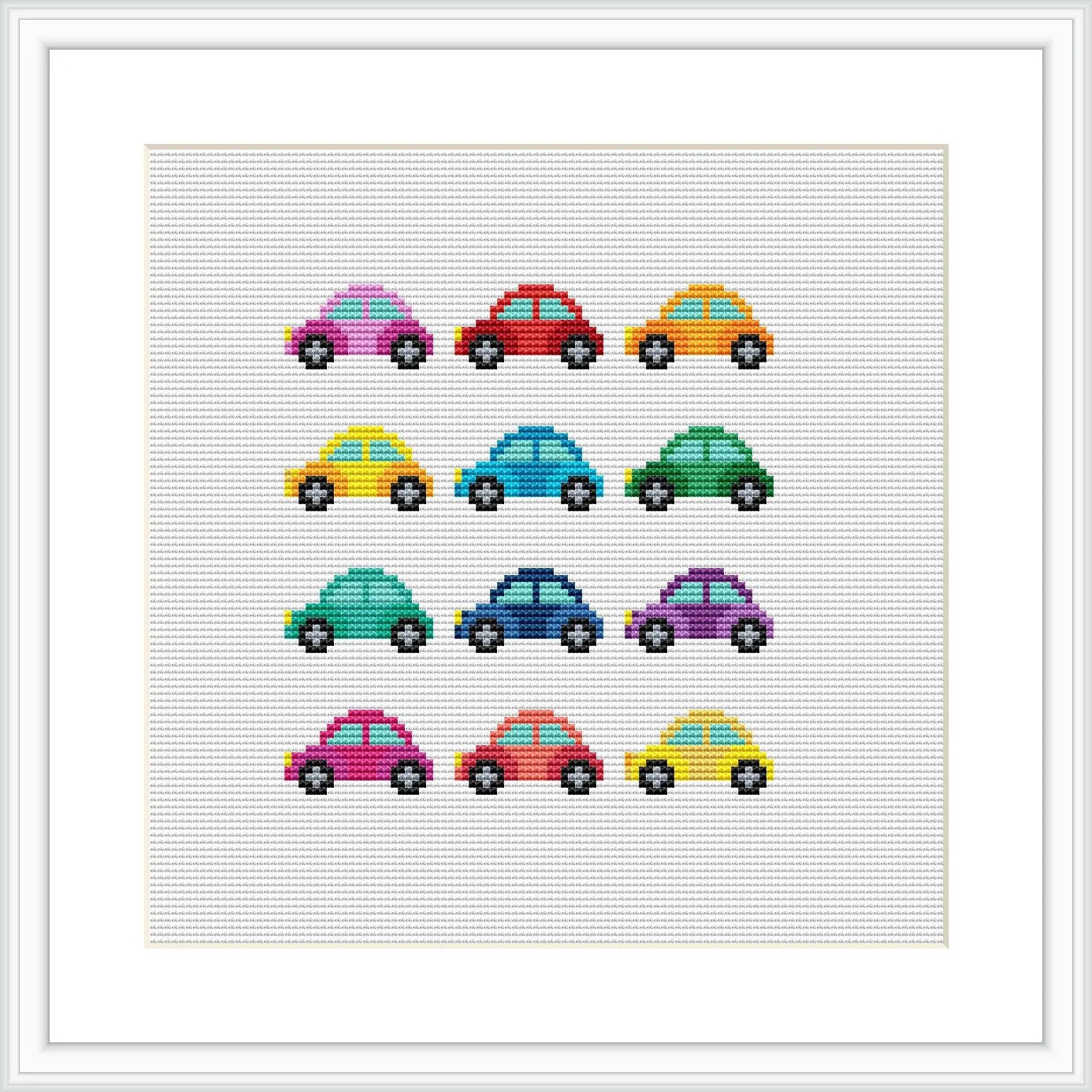 The image shows a cross-stitch pattern of cars in rainbow colors. There are nine cars arranged in a 3x3 grid, with each row featuring cars in different colors. The pattern is framed in white and centered within the frame.