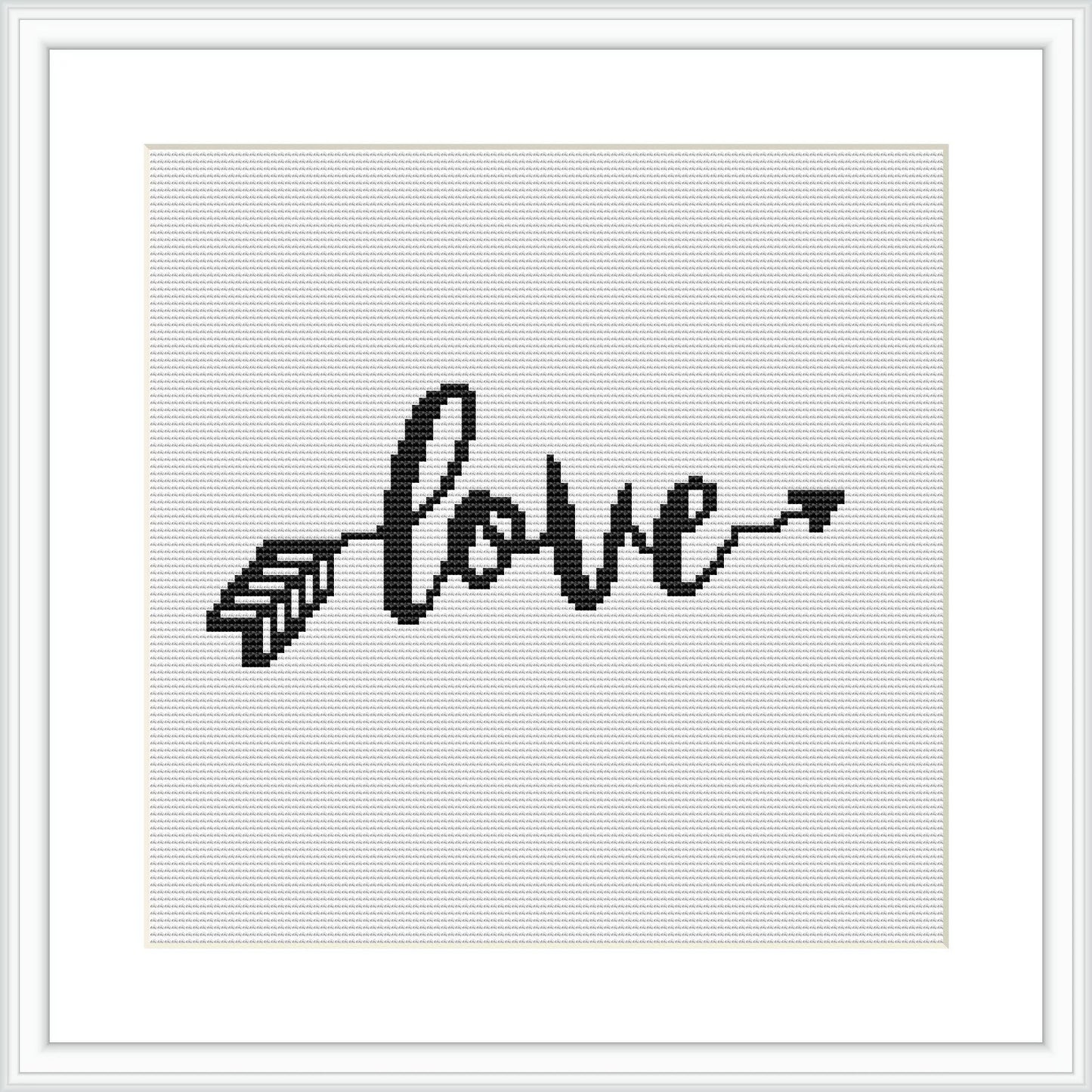 The image depicts a framed cross stitch pattern representing the word 'love' written in a cursive, calligraphic style with the last 'e' extending into an arrow. The pattern is monochrome, stitched with black thread on a white evenweave fabric.