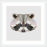 The image shows a framed cross stitch pattern of a stylized raccoon face with geometric shapes and a low poly design, predominantly in pastel pink and grey tones.