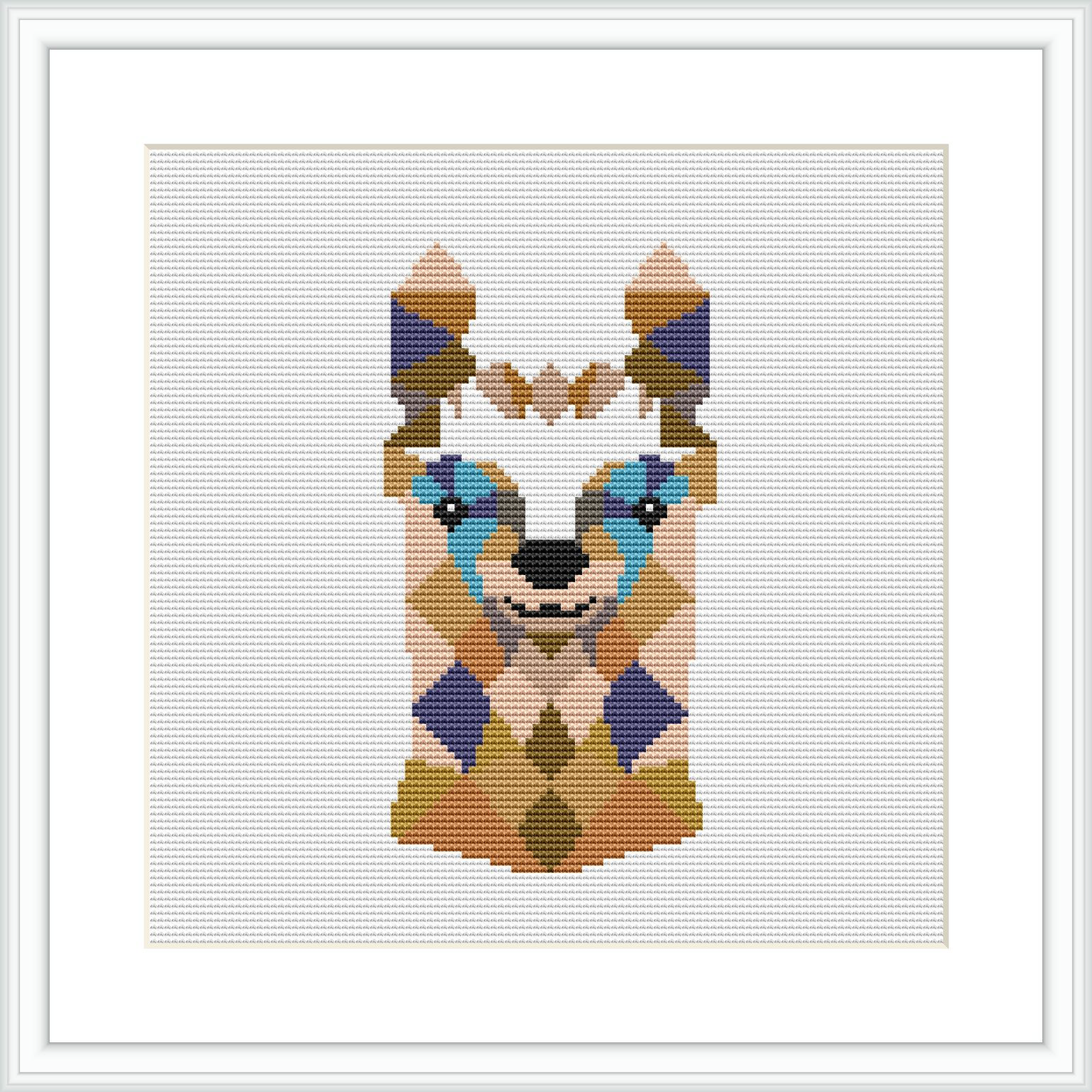 A framed cross stitch pattern of a stylized llama face predominantly in shades of teal, beige, purple, and brown, presented on a white background within a square frame.