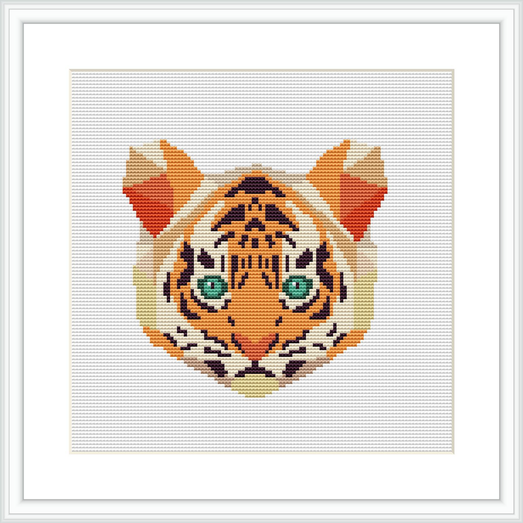 The image is a cross stitch pattern of a tiger's face, centered on a square canvas. The tiger's eyes are strikingly detailed in green, surrounded by fur patterns primarily in orange, black, and white. The pattern is presented within a frame.