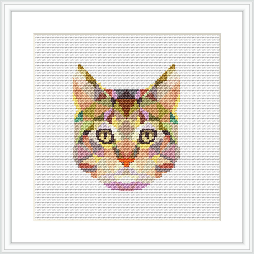 The image displays a framed cross stitch pattern of a cat's face, composed of various geometric shapes and colorful patterns, centered on a white canvas.