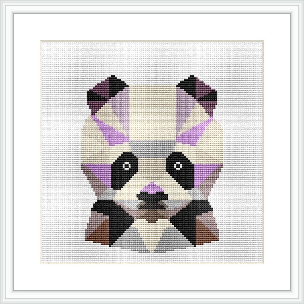 The image showcases a framed cross stitch pattern depicting a geometric representation of a panda's face. The pattern is square in shape, with a noticeable pixelated style, and uses a variety of colors, predominantly white, black, and shades of purple and brown.