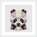 The image showcases a framed cross stitch pattern depicting a geometric representation of a panda's face. The pattern is square in shape, with a noticeable pixelated style, and uses a variety of colors, predominantly white, black, and shades of purple and brown.