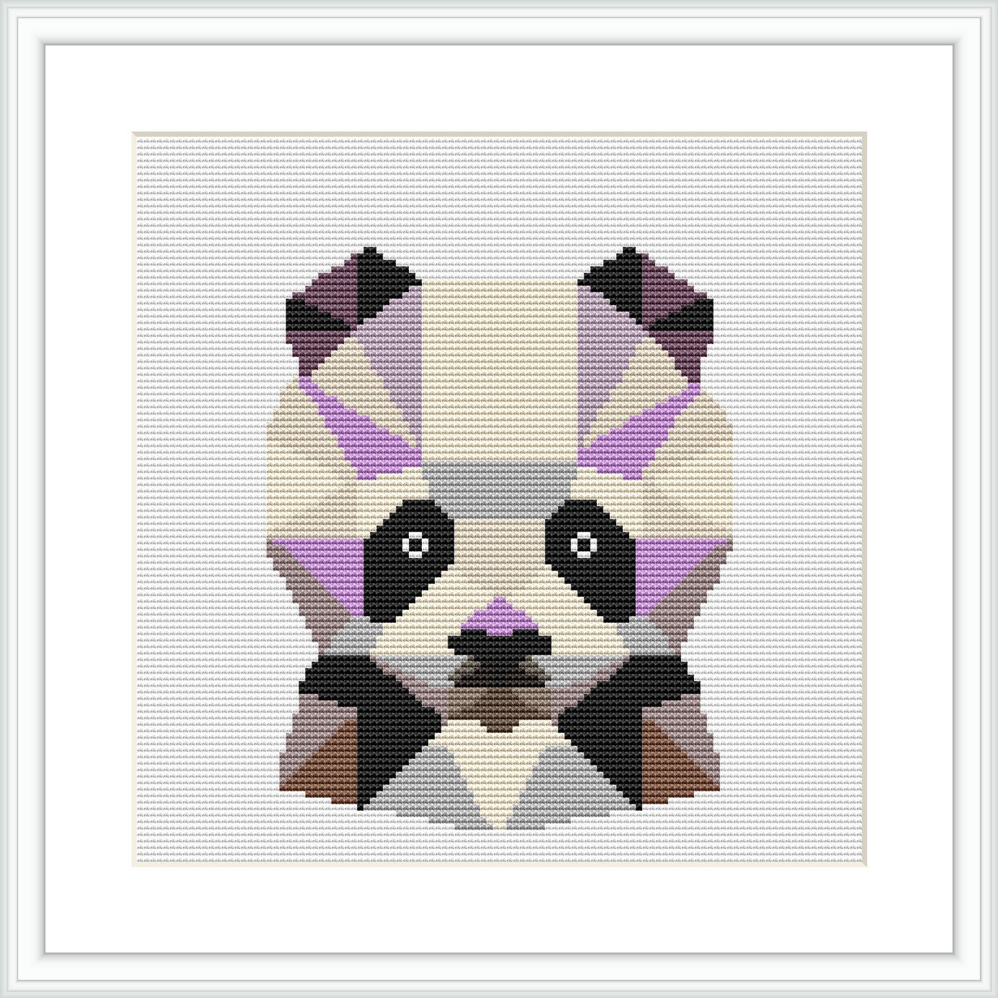 The image showcases a framed cross stitch pattern depicting a geometric representation of a panda's face. The pattern is square in shape, with a noticeable pixelated style, and uses a variety of colors, predominantly white, black, and shades of purple and brown.