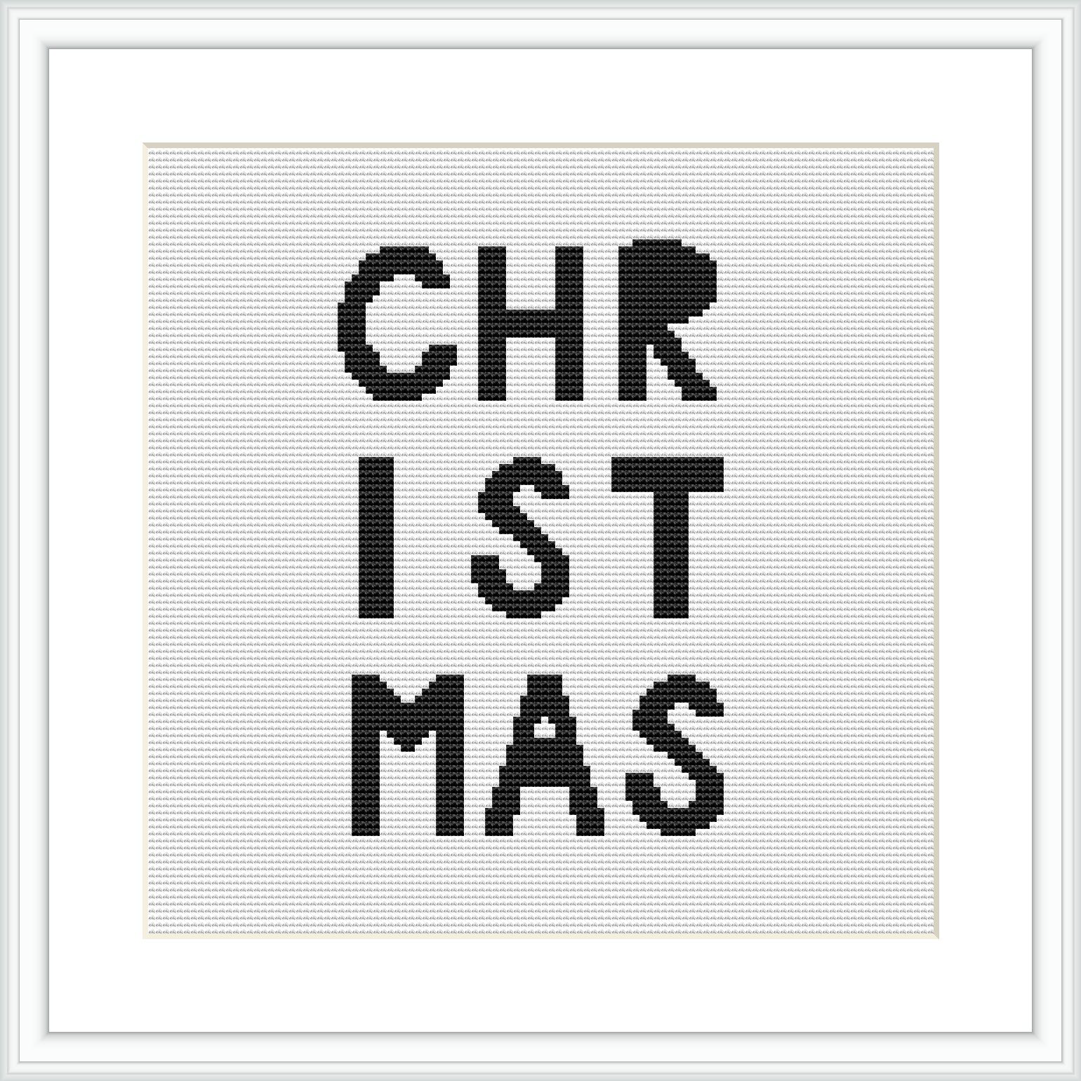 The image displays a framed cross stitch pattern with the word 'CHRISTMAS' spread out over three lines in a bold, sans-serif typeface. The letters are colored in black on a white canvas.