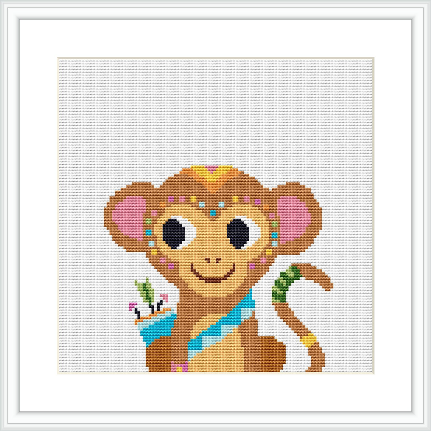 The image depicts a cross stitch pattern of a cartoonish monkey with tribal patterns, situated centrally against a white background, framed in what appears to be a wall mounted picture frame.