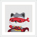 The image features a cross stitch pattern of a cartoon-style raccoon dressed as a superhero. The raccoon has a mask, cape, and is striking a heroic pose.