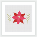 The image features a framed cross stitch pattern showcasing a stylized red and pink poinsettia flower with green and yellow foliage on a white background.