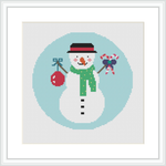 The image features a snowman centered against an aqua blue background. The snowman has a black hat, a green scarf, black buttons, a carrot nose and is holding a red bag and a candy cane with a pink bow.