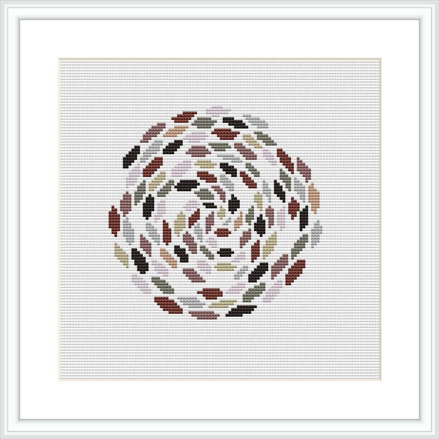 The image displays a framed cross stitch pattern featuring an abstract circular design in neutral colors on a white canvas.