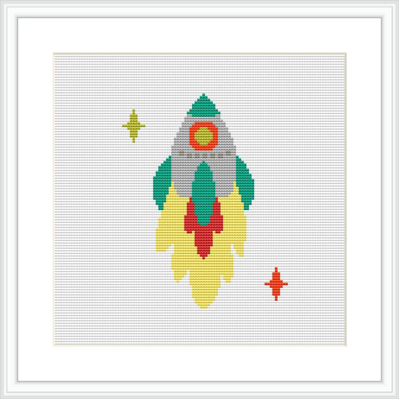 The image showcases a cross stitch pattern of a stylized space rocket with flames at the bottom, accompanied by two stars, one larger on the left and a smaller one on the right.