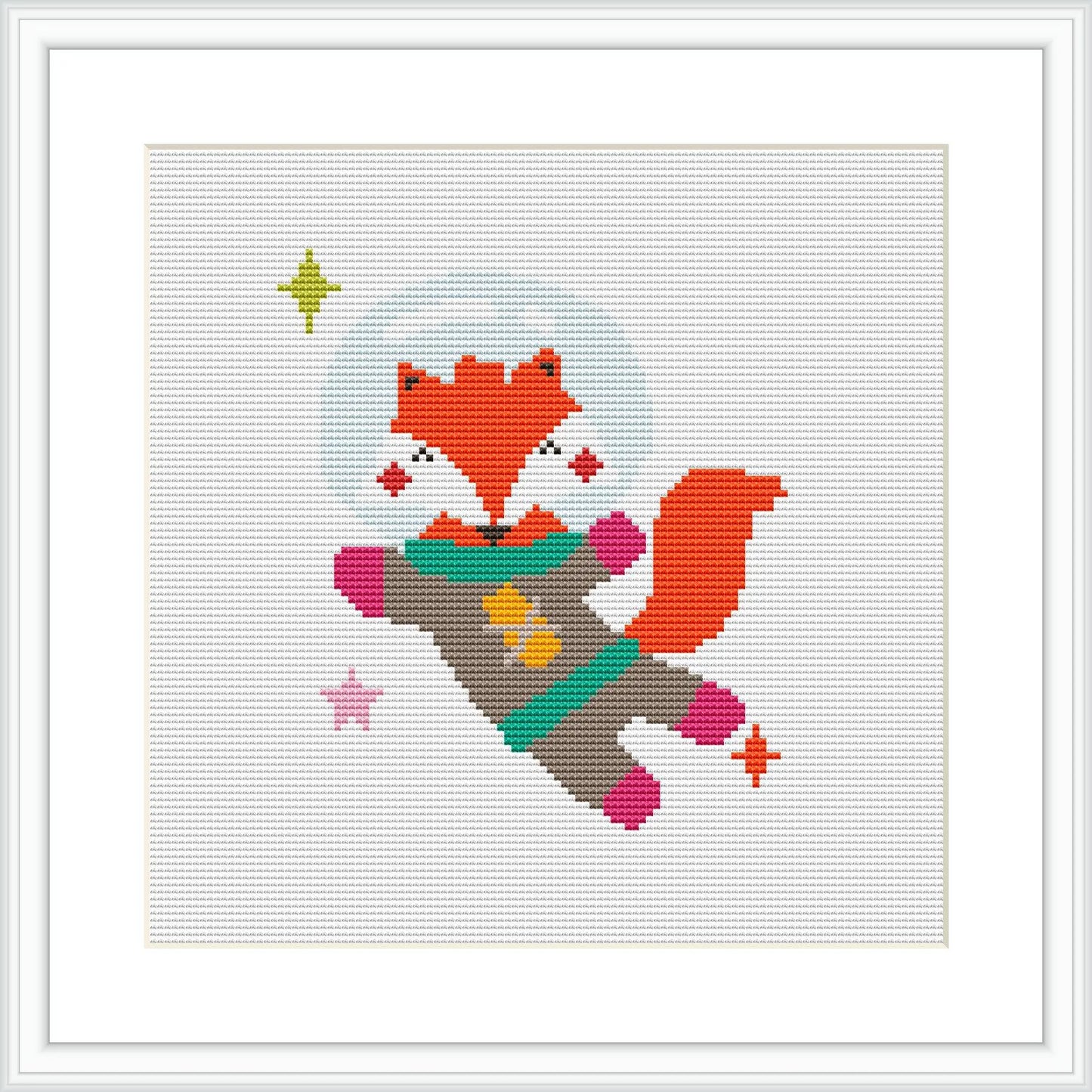 The image portrays a pixelated design of a fox with elements of space, including a rocket, stars, and a pixel heart, displayed on a cross stitch canvas.