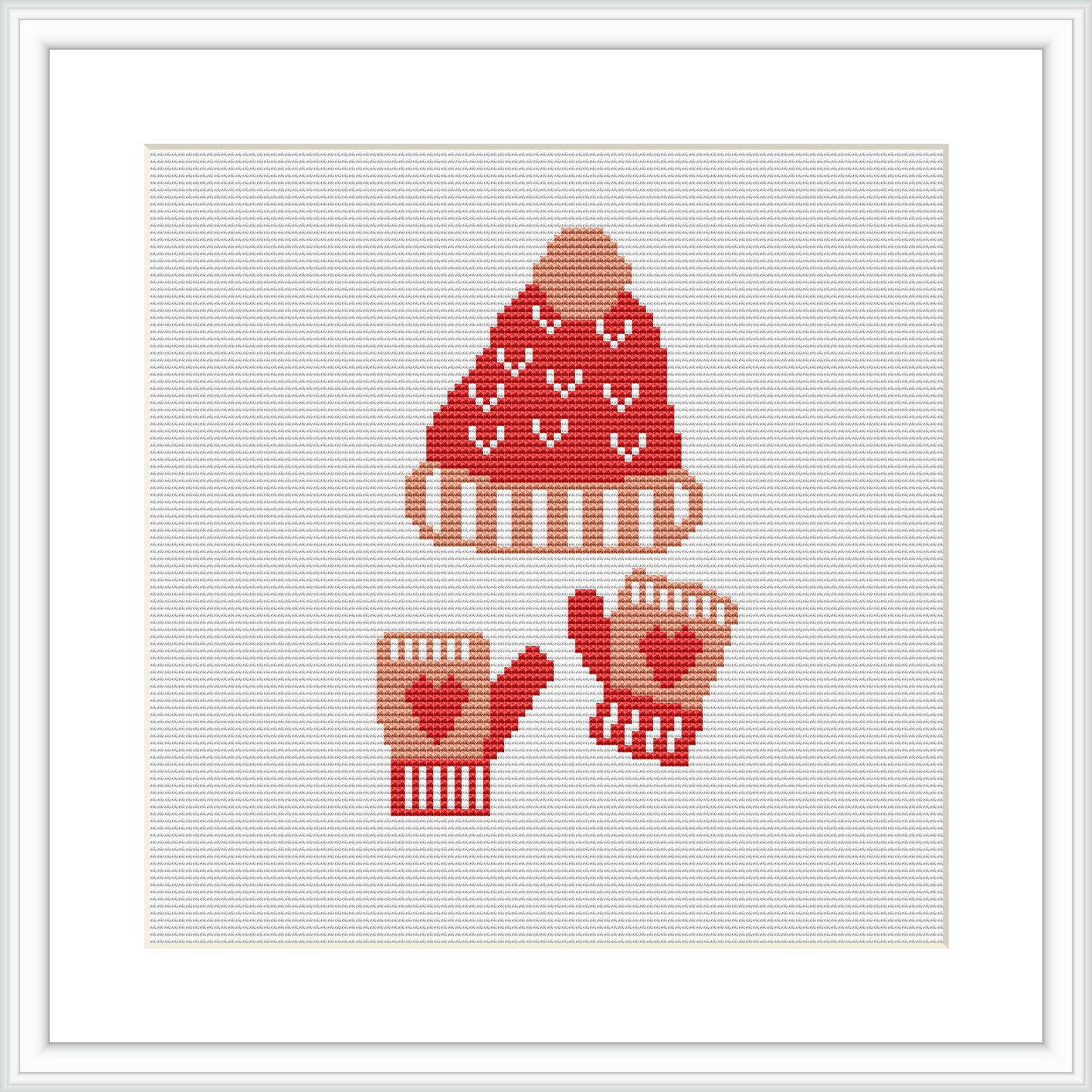 A cross stitch pattern featuring a stylized red and white Christmas hat at the top and a pair of matching mittens below, all centered on a white canvas within a frame.