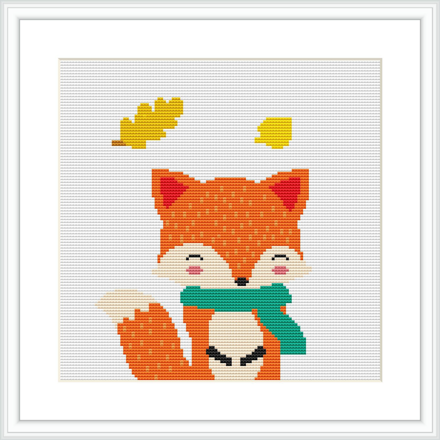 A cross stitch pattern depicting a stylized orange fox with a mischievous expression, wearing a green scarf. The fox is surrounded by falling yellow and brown leaves, all stitched on a white fabric background within a square frame.