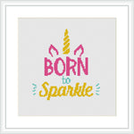 The image depicts a phrase 'Born to Sparkle' in stylized lettering with unicorn-themed elements like ears and a horn, adorned with stars, all arranged within a square frame on a plain background.