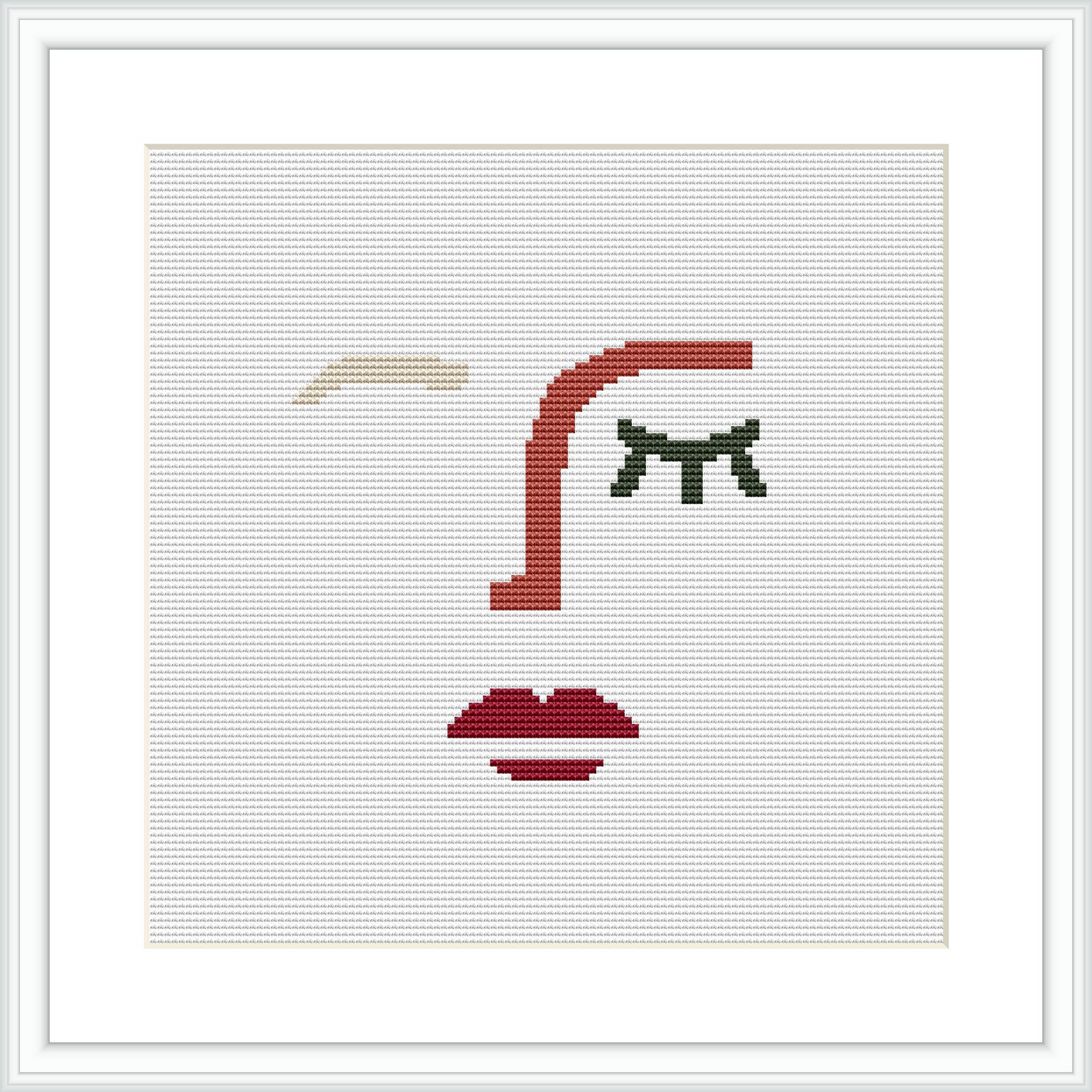 The image presents a framed cross stitch pattern depicting an abstract representation of a face with elements such as an eyebrow, an eye, a nose, and lips placed sporadically on a white background.