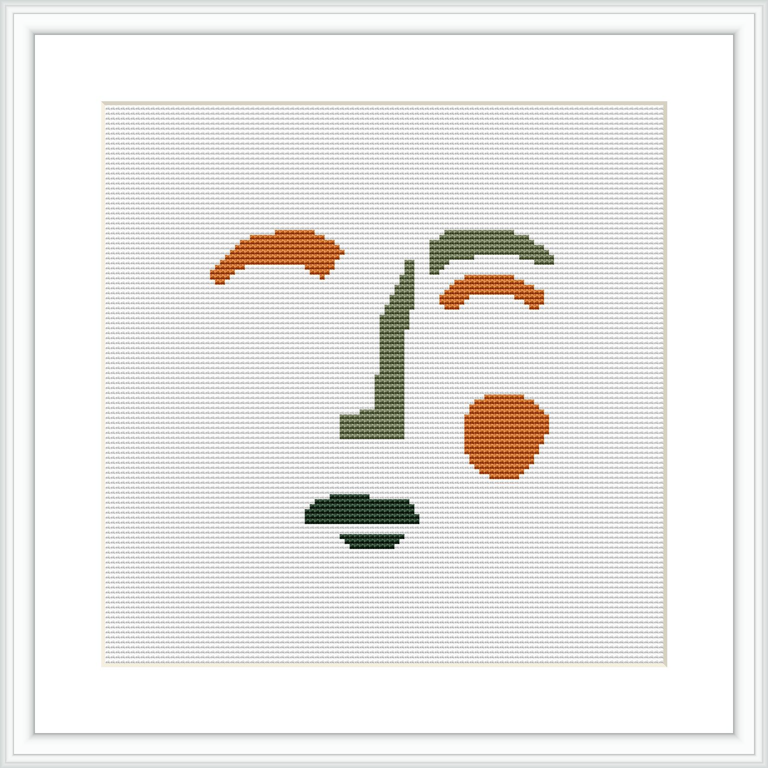 The image displays a framed cross stitch pattern on a white background, featuring abstract shapes reminiscent of the human face, arranged in a sporadic yet balanced manner.