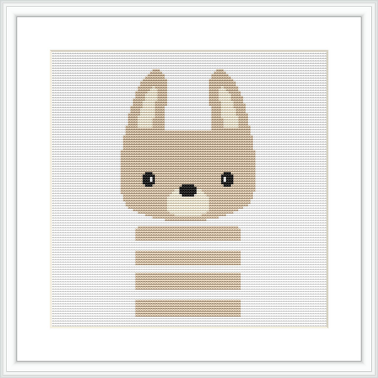 The image depicts a cross stitch design of a stylized bunny with pointed ears and horizontal stripes on its body, framed by a white border on a grey squared background.