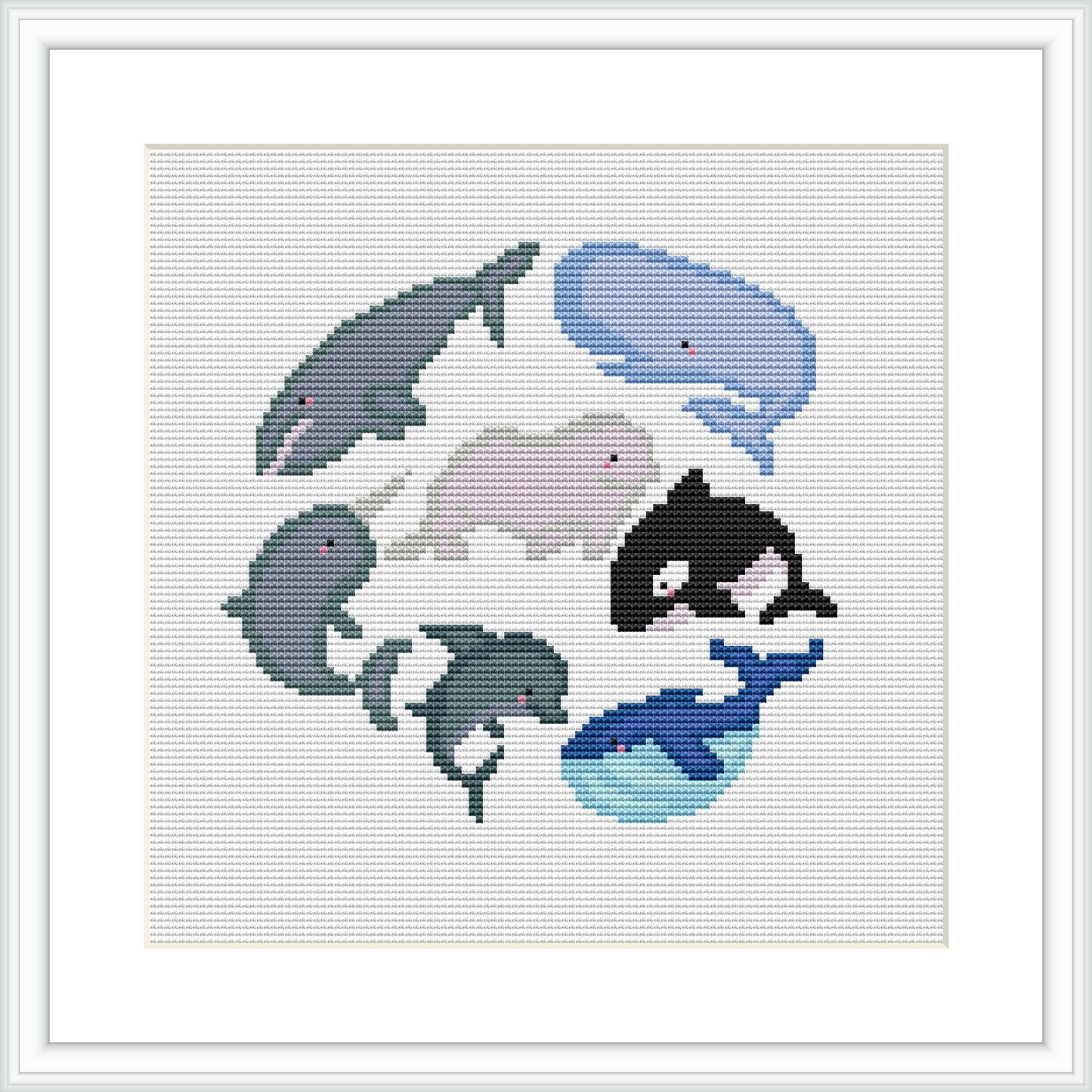 The image shows a framed cross stitch piece with various whales arranged in a pattern. The designs are pixelated due to the cross stitch technique and are depicted in shades of blue, grey, and white, with touches of pink and black.