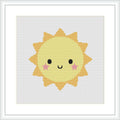 The image shows a stylized depiction of the sun with a cute face smiling in the center. The sun has rays extending outward and is predominantly yellow with touches of orange and pink on its cheeks.