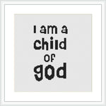 The image displays a framed cross stitch piece with the phrase 'I am a child of God' centered in a simple, modern typeface. The text is black on a white Aida cloth background, and it is presented within a square frame.