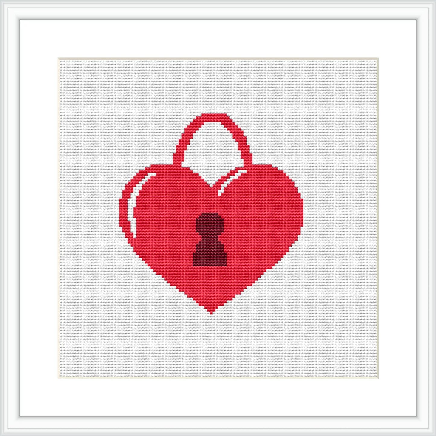 The image features a heart-shaped padlock design for cross stitch embroidery, centered on a white canvas within a square frame. The padlock is rendered in shades of red and pink, with a black keyhole at the center.