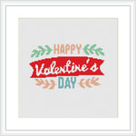 The image showcases a square cross-stitch pattern featuring a stylized banner with the text 'Happy Valentine's Day' surrounded by decorative elements like foliage and arrows.