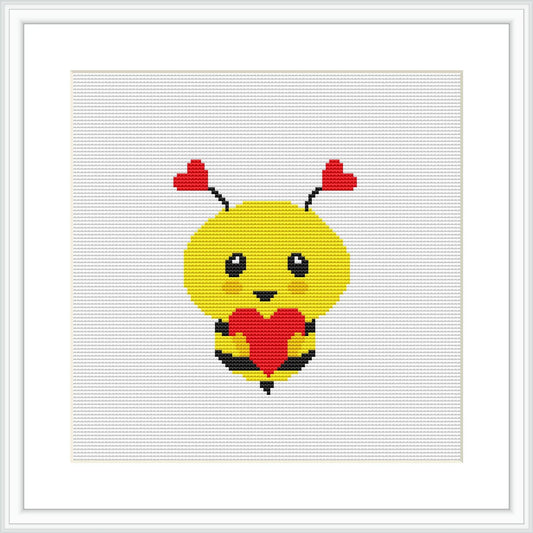 The image shows a yellow bee with red hearts for wings and antennas, holding a larger red heart, centered on a white canvas framed in a square format within a simple black frame.