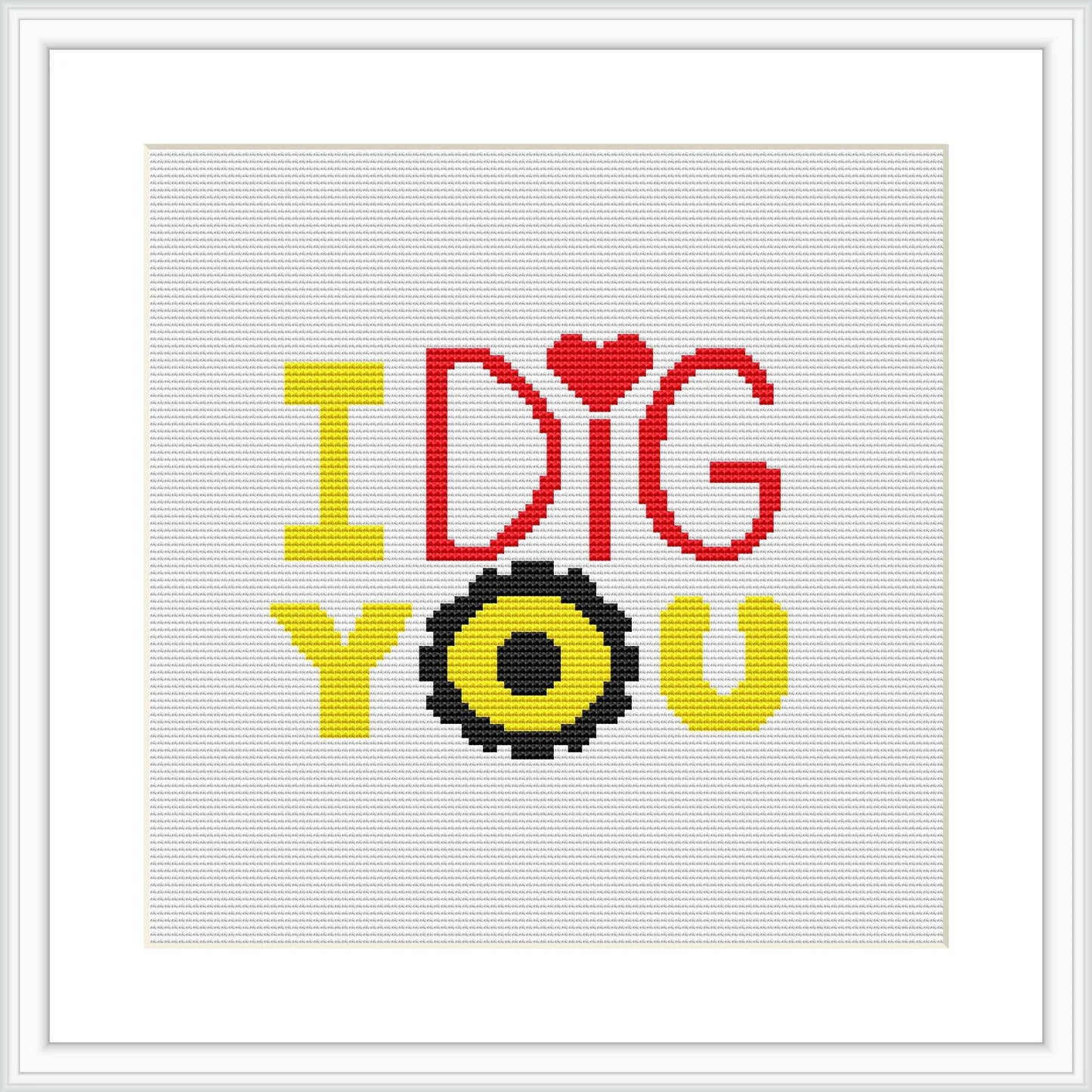 The image depicts a framed cross stitch pattern with the phrase 'I DIG YOU' in bold, colorful letters. The 'I' is in black, 'DIG' in yellow, red, and gray to form a pixelated heart shape for the 'I,' and 'YOU' in black. There's a yellow and black pixelated shovel after 'DIG.' The background is white.