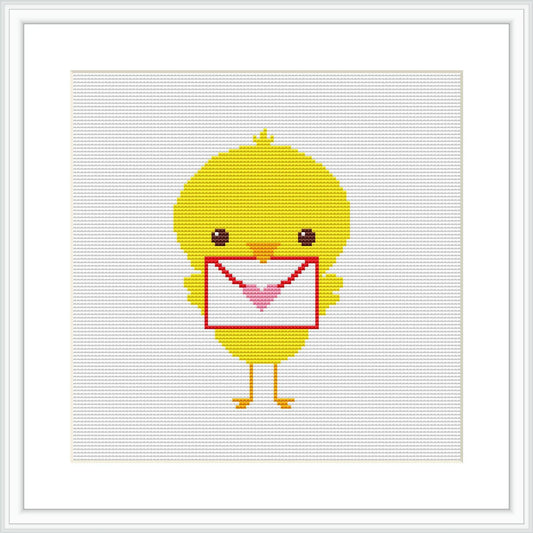 The image depicts a cross stitch pattern of a cute yellow chick standing upright. It holds a white envelope with a red heart on its flap, suggesting a theme of sending love or affection. The background is blank, allowing the chick to be the focal point.