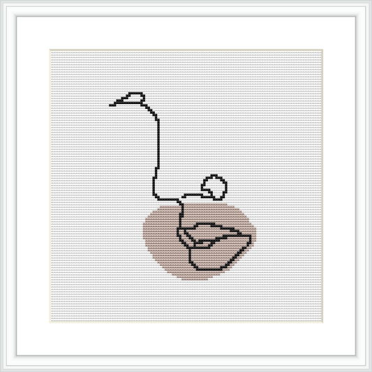 The cross stitch pattern depicts an abstract, minimalist design of facial features such as a mouth and nose, with a stylized eye represented by a circular element above the eyebrow area, all framed within a classic white border against a white background.